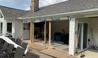 house showing the procesw of being cut in, to install new patio doors